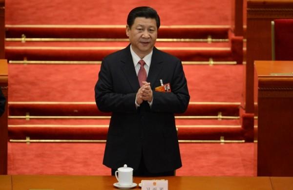 Xi Jinping (foto) sucede a Hu Jintao à frente da segunda potência econômica mundial  (France Press)