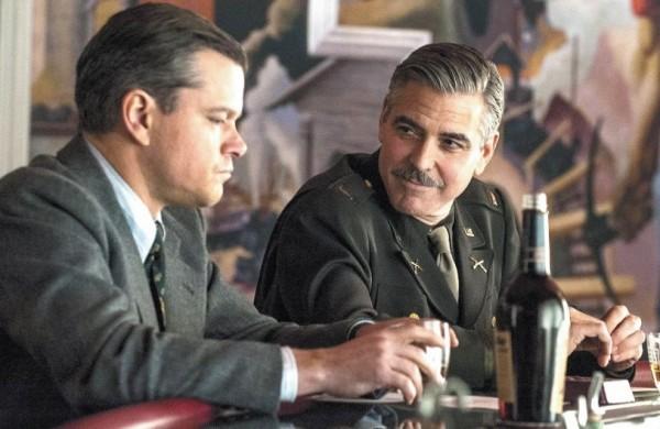 George Clooney e Matt Damon em cena do filme &quot;Ca&ccedil;adores de Obras-Primas&quot; ( Divulgação)