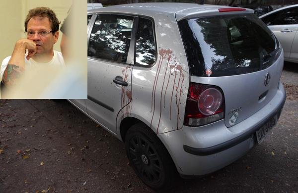 Carro da v&iacute;tima ficou com as marcas da viol&ecirc;ncia: no detalhe, o policial federal suspeito de cometer o crime contra um corretor   ( Rodrigo Zanotto/ Especial para a AAN)