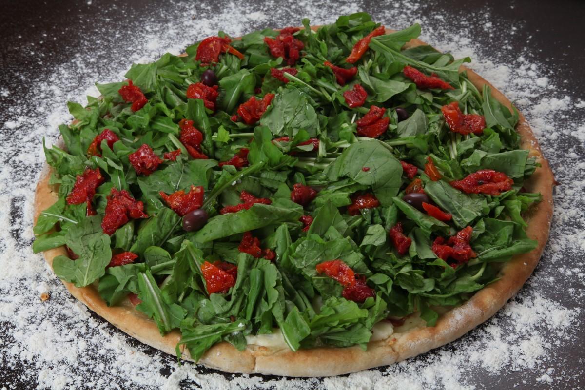 Bonelli Restaurante, um das pizzarias mais tradicionais da cidade, igualou o preço de diversos sabores para as pessoas poderem comemorar a data  (Giancarlo Giannelli/ Divulgação )