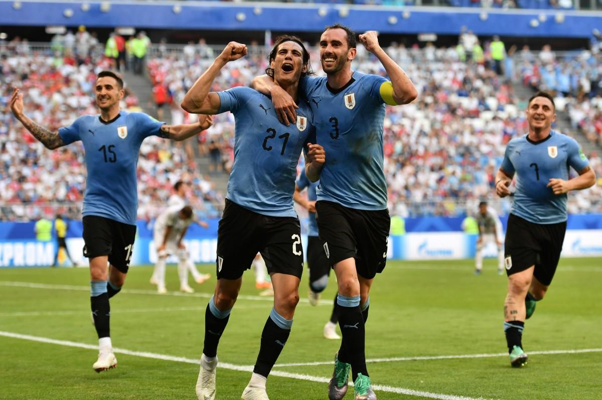 Uruguai bate a Rússia, mantém os 100% e avança como líder do Grupo Ar
 (AFP)