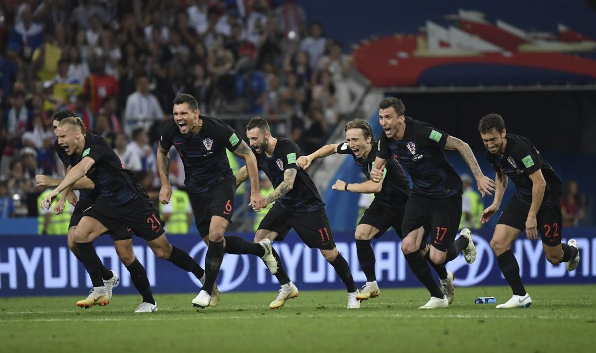 Jogadores da Croácia comemoram a classificação para a semifinal (AFP)
