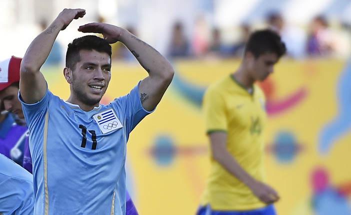 O uruguaio Ignacio Gonzalez comemora a classifica&ccedil;&atilde;o obtida em cima do Brasil (France Press)