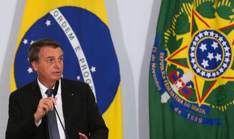  O presidente Jair Bolsonaro participa da solenidade de assinatura dos decretos do Aux..lio G..s e do Programa Alimenta Brasil,  no Pal..cio do Planalto
     ( Valter Campanato/Ag..ncia Brasil)