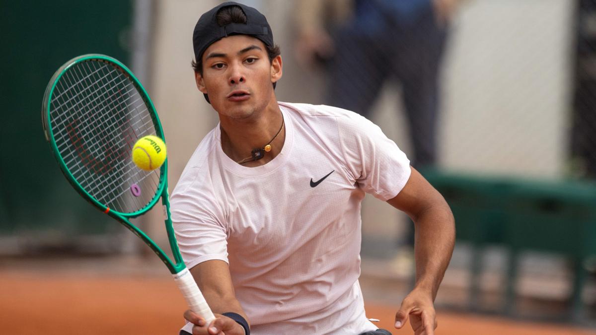 Guto Miguel contra Leonardo Storck no juvenil de Roland Garros (Tim Clayton/Getty Images)