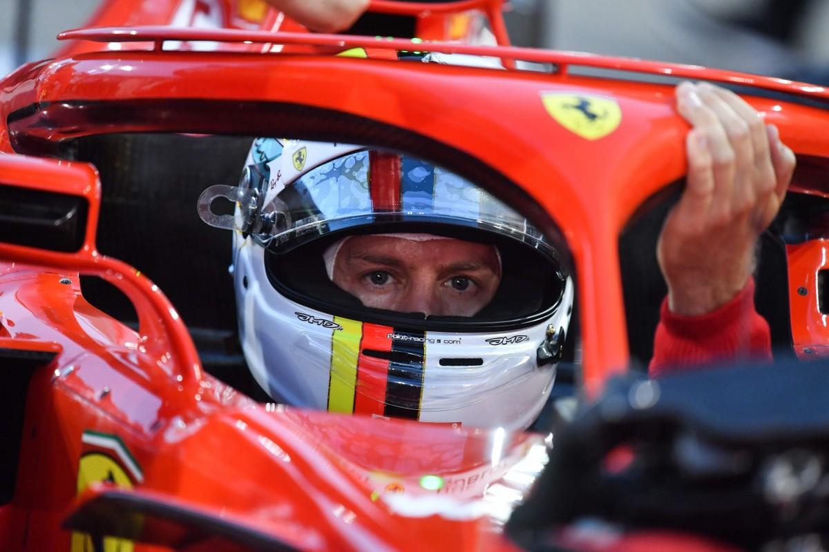 Em sua 200ª corrida na F1, Vettel cruzou a linha de chegada à frente dos dois carros da Mercedes (AFP PHOTO / Andrej ISAKOVIC )