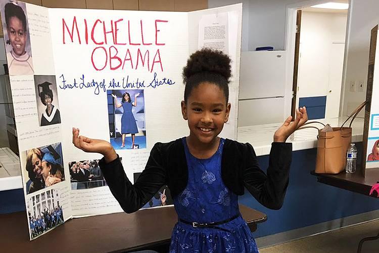 Garotinha se veste como Michelle Obama e recebe nota A+ via Twitter (Reprodução)