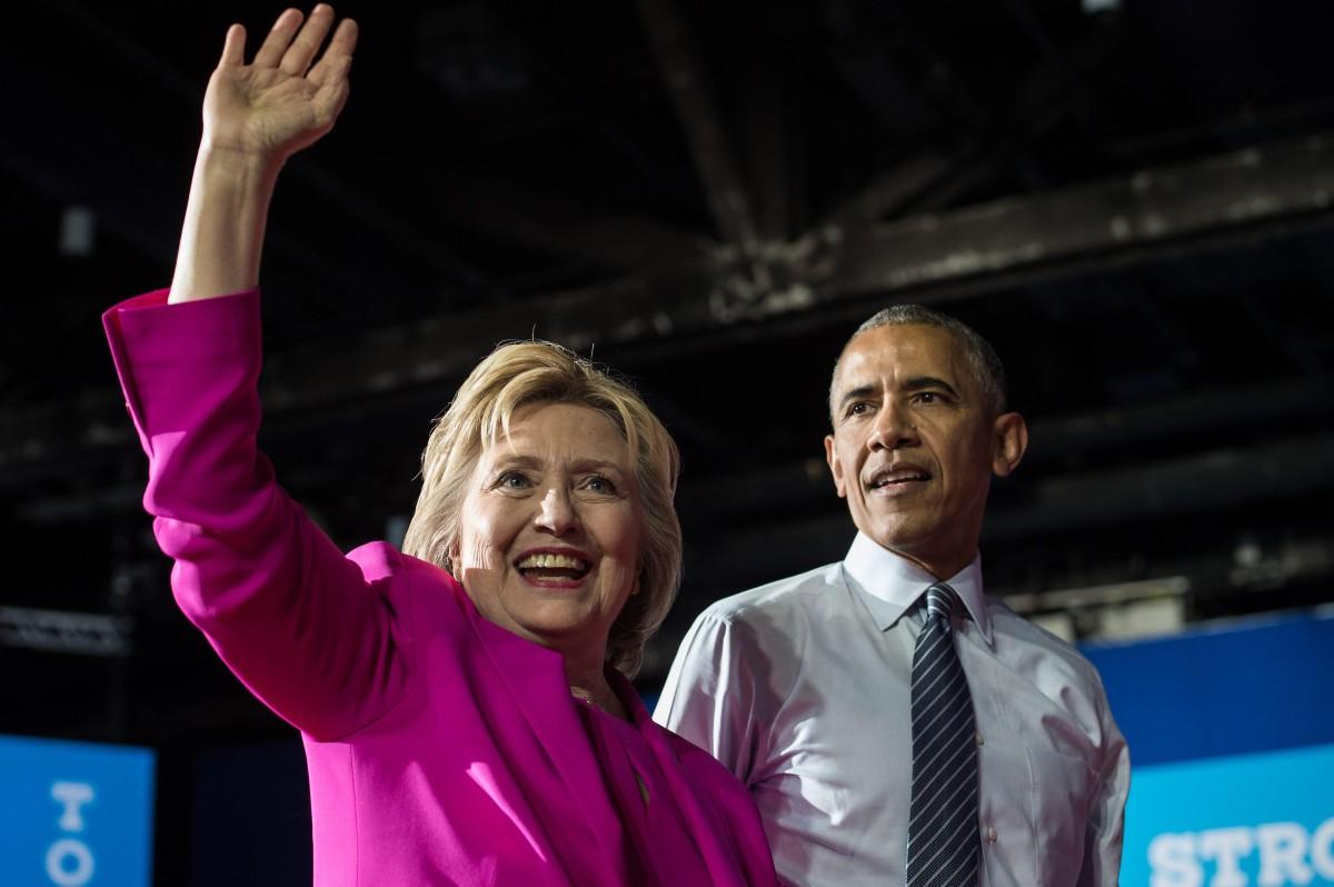 "Estou aqui hoje, porque eu acredito na Hillary Clinton", endossou Obama, em um comício em Charlotte, na Carolina do Norte (AFP PHOTO / NICHOLAS KAMM )