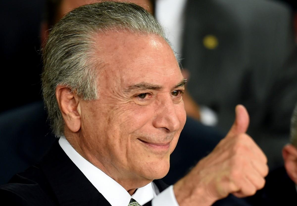 Michel Temer já confirmou que abrirá oficialmente os Jogos no dia 5 de agosto no estádio do Maracanã, algo que vinha sendo uma das preocupações do COI (AFP)