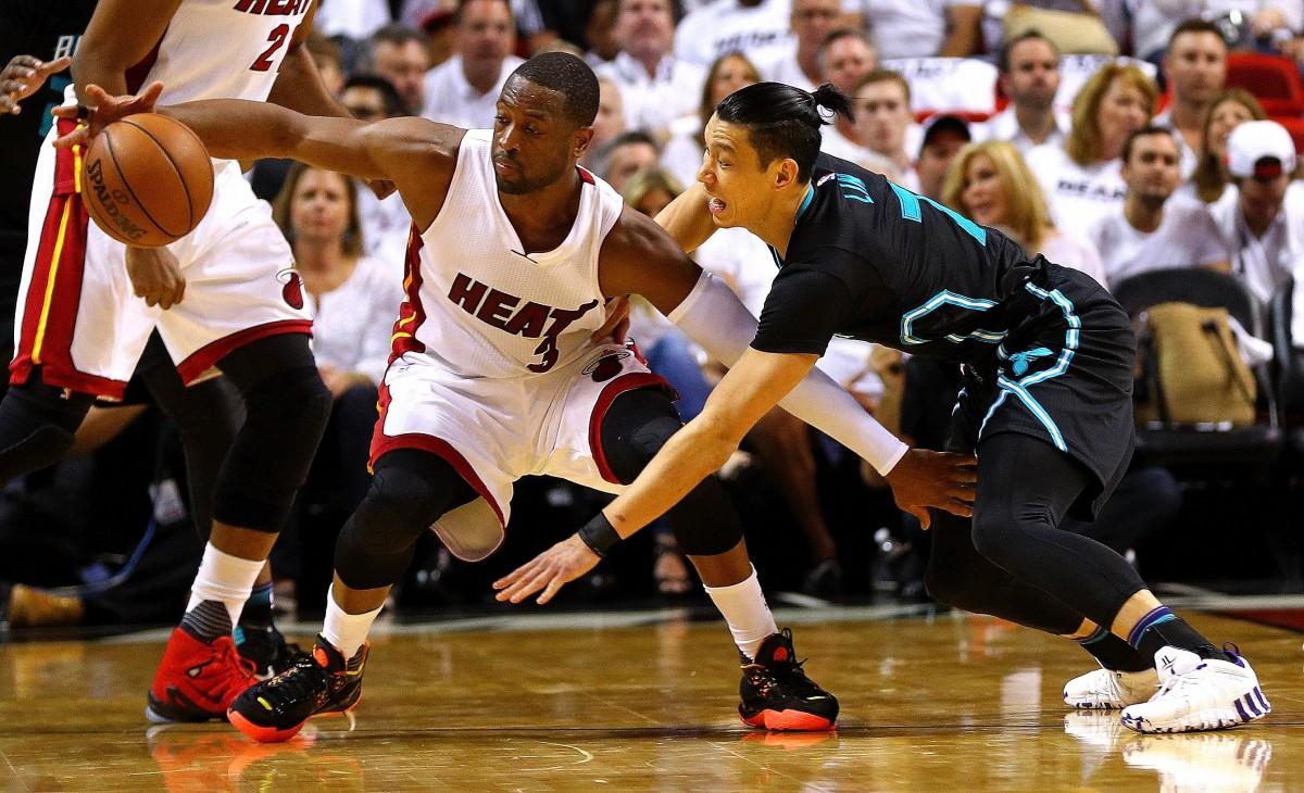 Jeremy Lin encara forte marcação do Heat, que segue vivo nos playoffs (AFP)