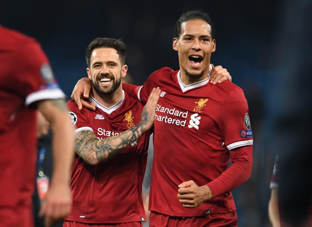Jogadores do Liverpool comemoram a classificação da equipe na Champions (AFP)
