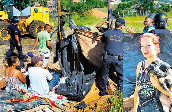 Guardas municipais retiram os barracos da área, sob o protesto das famílias. Bianca Bernardino da Silva, de 17 anos, observa seu barraco ser derrubado (Cristiano Diehi Neto)