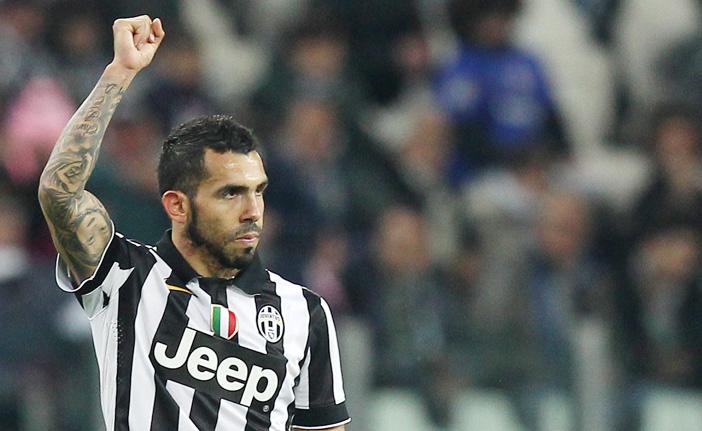 O atacante argentino Carlitos Tevez comemora em Turim: Juventus est&aacute; pertinho da quarta conquista consecutiva do Campeonato Italiano (France Press)