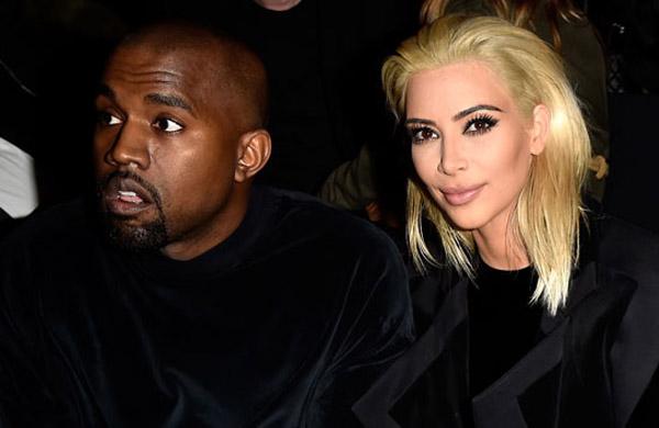 Cobertos por roupas pretas, Kardashian e West estavam junto de Kris Jenner, m&atilde;e da estrela dos &quot;reality shows&quot; ( Divulgação)
