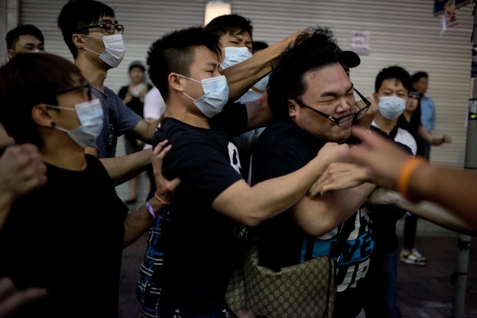 Ativistas a favor da democracia protestam em Hong Kong  (Alex Ogle/ AFP)