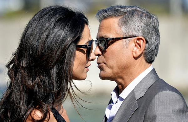 George Clooney e a esposa Amal Alamuddin (AFP)
