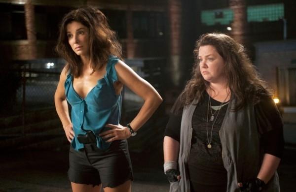 Cena da comédia 'As Bem-Armadas', com Sandra Bullock, Melissa McCarthy e Demian Bichir ( Divulgação)