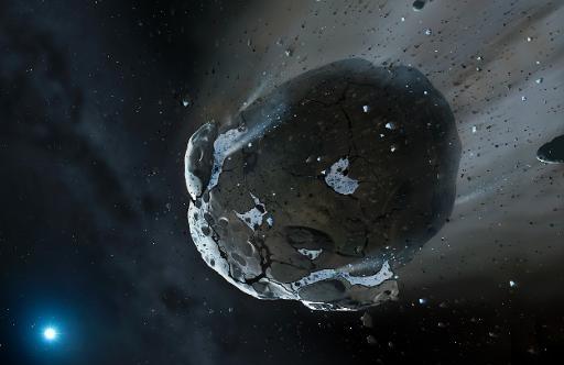 Projeção divulgada pela Universidade de Warwick mostra asteroide rico em água sendo puxado pela intensa gravidade da estrela anã GD 61  (Warwick & Cambridge Universities)