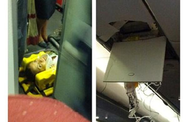 Imagens postadas pelo passageiro do voo da TAM e morador de Campinas Ricardo Pontes: passageiro sendo atendida e o teto da aeronave danificado (Reprodução/Instagran)
